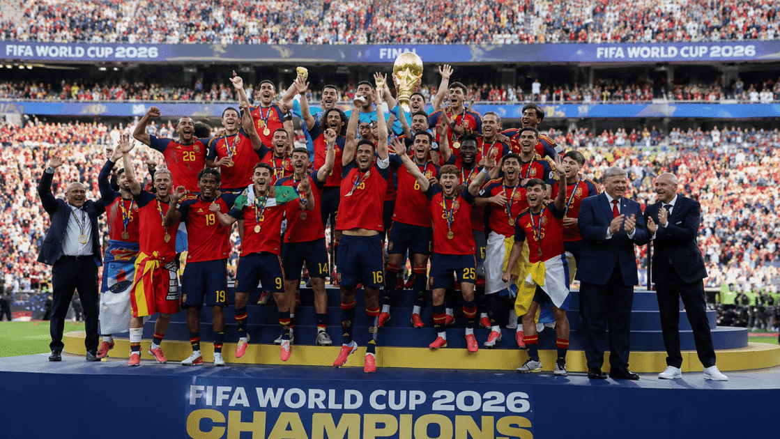 Spain celebrates after winning the FIFA World Cup 2026 as the team lifts the trophy during the championship ceremony.