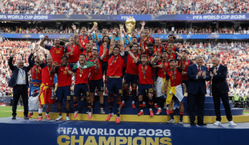 Spain celebrates after winning the FIFA World Cup 2026 as the team lifts the trophy during the championship ceremony.